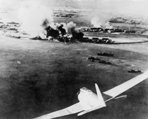 buildings and ships smoking after Japanese Attacked Pearl Harbor