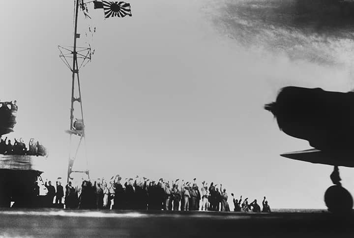 Crews Wave From Japanese Aircraft Carrier