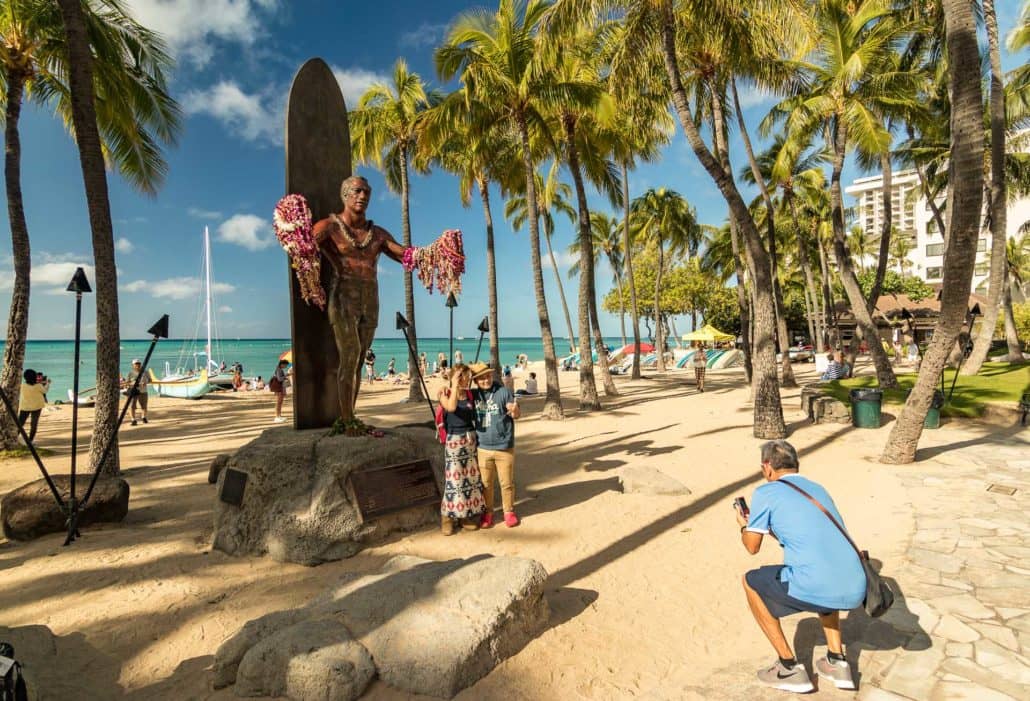 Duke Surfing Statue Kuhio Beach in Waikiki with people