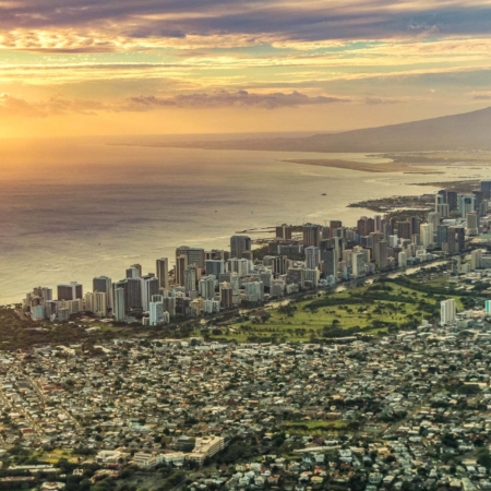 Sunset over Waikiki and Honolulu City aerial view