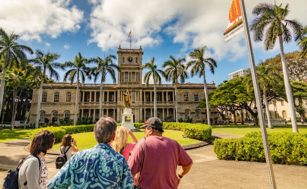 Aliiolani Hale and Kamehameha Statue Visitors and Sign Honolulu