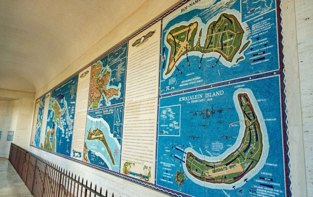 Mosaics of WWII battles line the hallways within Honolulu Memorial at Punchbowl