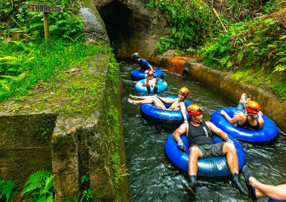 floating down a river to get your adrenaline pumping kauai mountain float tubing kauai back country