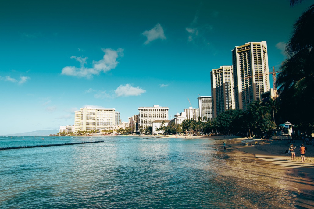 waikiki beach and tall city buildings in honolulu oahu hawaii